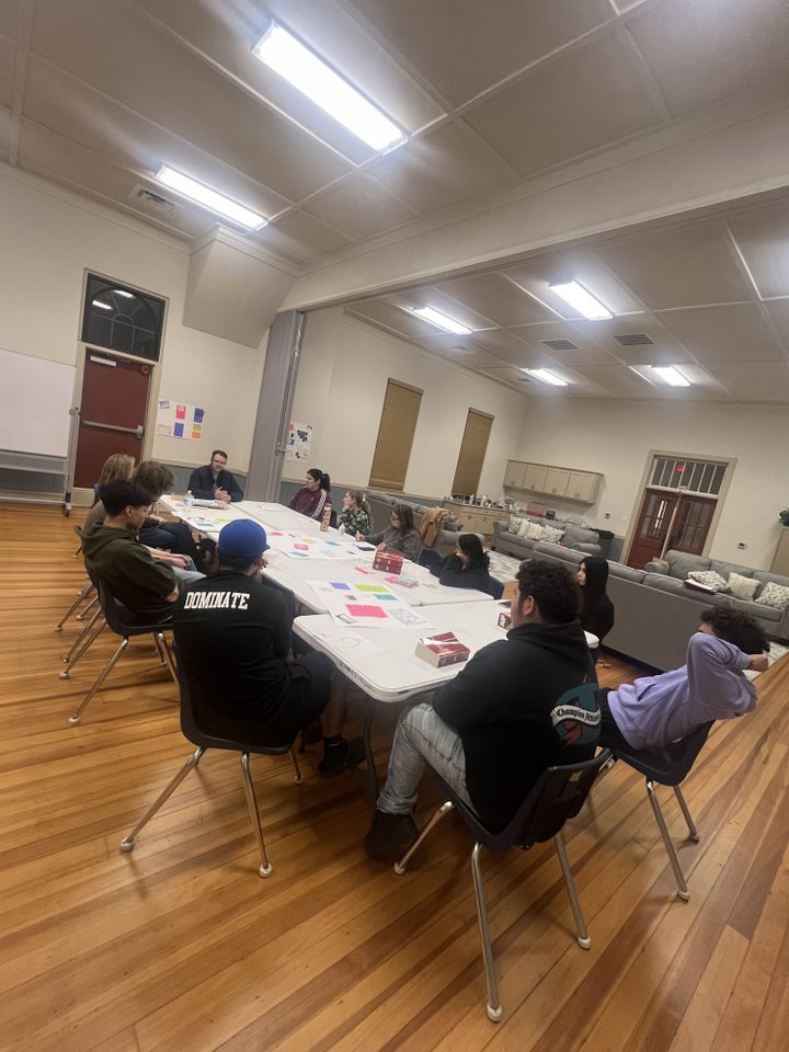 Middle school and high school students gathered for youth group
