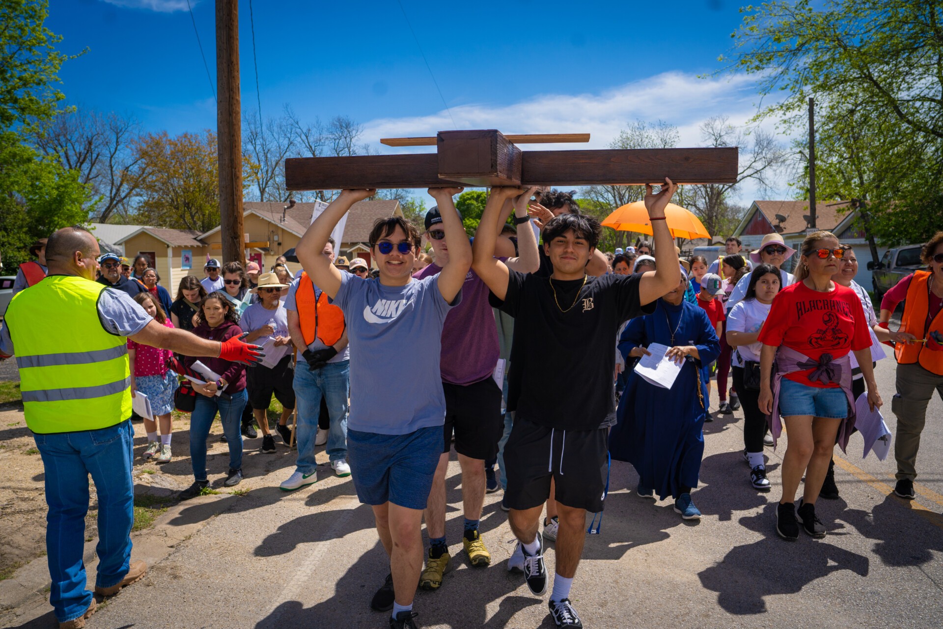 High school students participating in a public prayer event